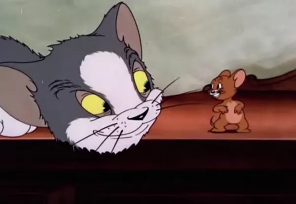 Кадр из эпизода Кот получает пинка в серии мультфильмов Том и Джерри