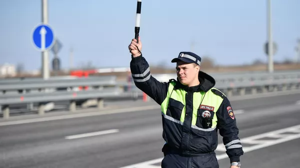 Сотрудник дорожно-патрульной службы