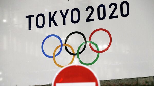 Баннер с символикой Олимпийских игр в Токио