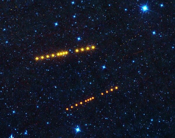 Серия фотографий астероидов Клото и Лина, снятые телескопом NEOWISE Серия фотографий астероидов Клото и Лина, снятые телескопом NEOWISE