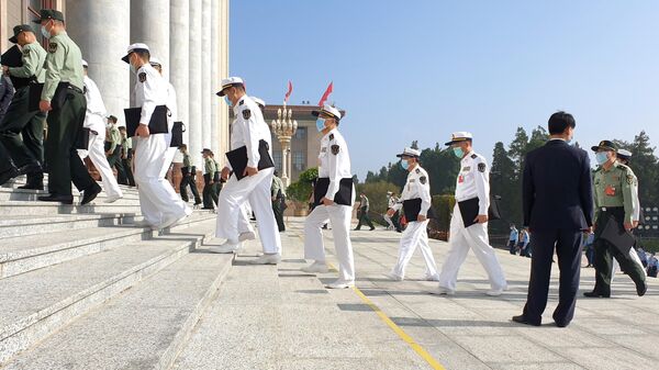 Участники сессии Всекитайского собрания народных представителей 13-го созыва в Пекине Участники сессии Всекитайского собрания народных представителей 13-го созыва в Пекине