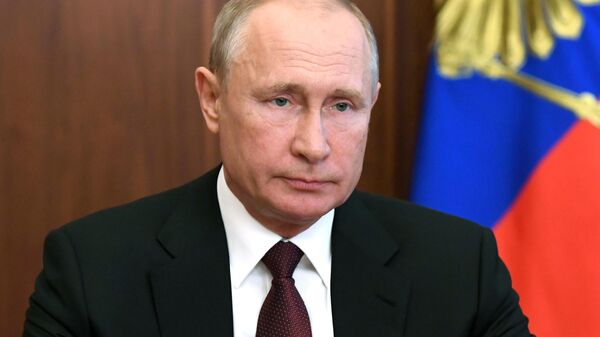 Президент России Владимир Путин во время обращения к гражданам России
