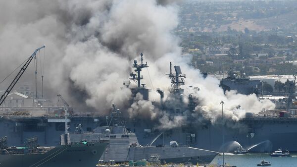 Smoke rises from the USS Bonhomme Richard at Naval Base San Diego Sunday, July 12, 2020, in San Diego after an explosion and fire Sunday on board the ship at Naval Base San Diego Smoke rises from the USS Bonhomme Richard at Naval Base San Diego Sunday, July 12, 2020, in San Diego after an explosion and fire Sunday on board the ship at Naval Base San Diego
