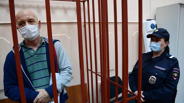 Эмбриолог, андролог ЭКО клиники NGC Тарас Ашитков, обвиняемый по делу о торговле детьми от суррогатных матерей, в Басманном суде Москвы Изображение внутри записи