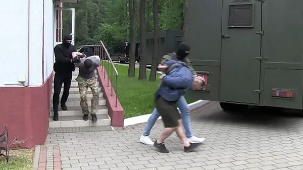 Кадр оперативного видео задержания россиян в Белоруссии