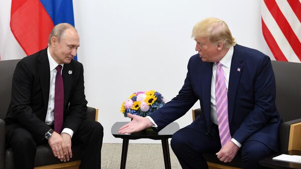 Президент РФ Владимир Путин и президент США Дональд Трамп (справа) во время встречи на полях саммита Группы двадцати в Осаке Президент РФ Владимир Путин и президент США Дональд Трамп (справа) во время встречи на полях саммита Группы двадцати в Осаке