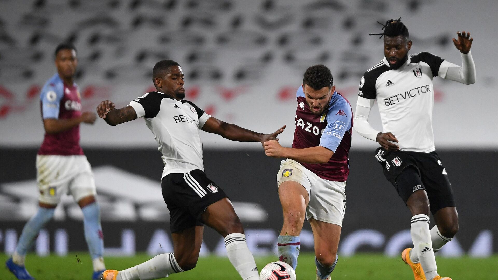 Fulham's Portuguese striker Ivan Cavaleiro (L fouls Aston Villa's Scottish midfielder John McGinn during the English Premier League football match between Fulham and Aston Villa at Craven Cottage in London on September 28, 2020. (Photo by Mike Hewitt / POOL / AFP) / RESTRICTED TO EDITORIAL USE. No use with unauthorized audio, video, data, fixture lists, club/league logos or 'live' services. Online in-match use limited to 120 images. An additional 40 images may be used in extra time. No video emulation. Social media in-match use limited to 120 images. An additional 40 images may be used in extra time. No use in betting publications, games or single club/league/player publications. / Fulham's Portuguese striker Ivan Cavaleiro (L fouls Aston Villa's Scottish midfielder John McGinn during the English Premier League football match between Fulham and Aston Villa at Craven Cottage in London on September 28, 2020. (Photo by Mike Hewitt / POOL / AFP) / RESTRICTED TO EDITORIAL USE. No use with unauthorized audio, video, data, fixture lists, club/league logos or 'live' services. Online in-match use limited to 120 images. An additional 40 images may be used in extra time. No video emulation. Social media in-match use limited to 120 images. An additional 40 images may be used in extra time. No use in betting publications, games or single club/league/player publications. / - РИА Новости, 1920, 28.09.2020