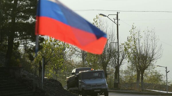 Флаг российских миротворцев на одной из улиц в городе Лачин (Бердзор) в Нагорном Карабахе Флаг российских миротворцев на одной из улиц в городе Лачин (Бердзор) в Нагорном Карабахе