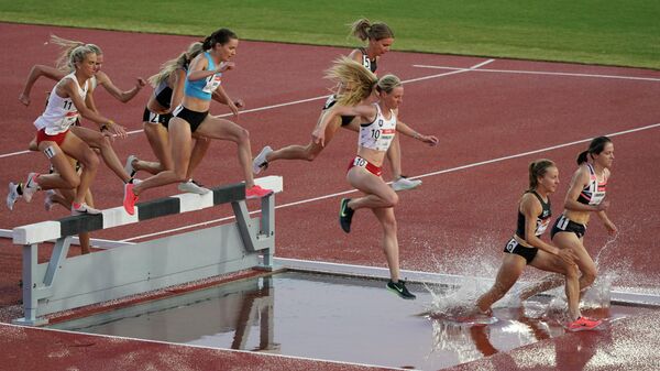 Атлеты во время соревнований USATF Golden Games 2021 Атлеты во время соревнований USATF Golden Games 2021