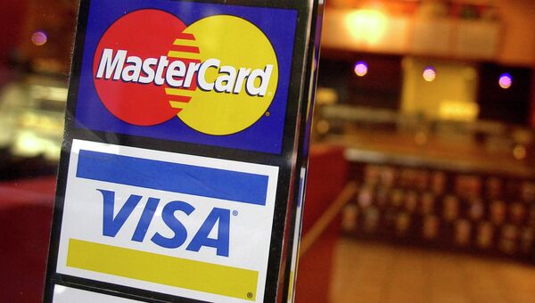 Платежные системы Visa и MasterCard, архивное фото Платежные системы Visa и MasterCard, архивное фото
