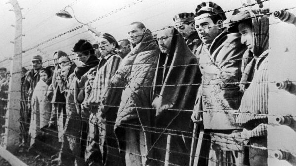 Узники концентрационного лагеря. Архивное фото Узники концентрационного лагеря. Архивное фото