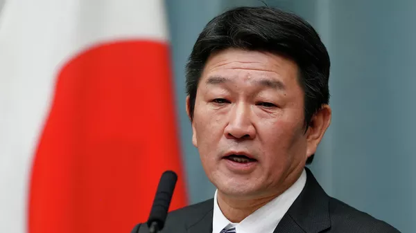 Министр экономики Японии Тосимицу Мотэги
