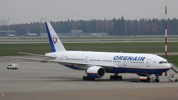 Боинг 777-2Q8ER авиакомпании Оренбургские авиалинии в московском аэропорту Шереметьево Боинг 777-2Q8ER авиакомпании Оренбургские авиалинии в московском аэропорту Шереметьево