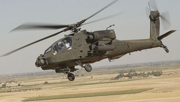 Вертолет Apache. Архивное фото Вертолет Apache. Архивное фото