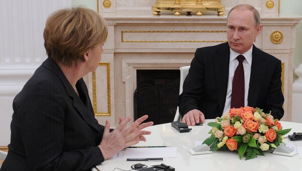 Президент России Владимир Путин и федеральный канцлер Германии Ангела Меркель. Архивное фото Президент России Владимир Путин и федеральный канцлер Германии Ангела Меркель. Архивное фото