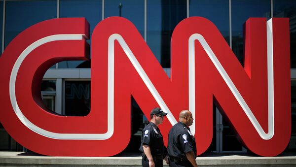 Логотип телеканала CNN в Атланте, США. Архивное фото Логотип телеканала CNN в Атланте, США. Архивное фото