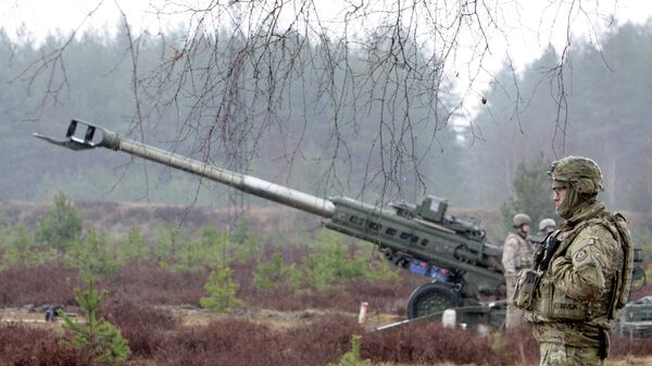 Военнослужащие блока НАТО на полигоне Адажи в Латвии. Архивное фото Военнослужащие блока НАТО на полигоне Адажи в Латвии. Архивное фото
