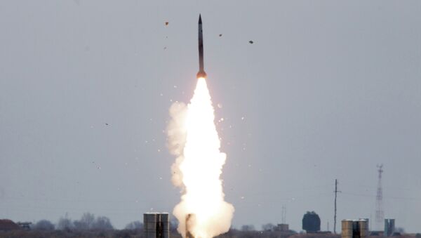 Пуск ракеты зенитно-ракетной системой С-300. Архивное фото Пуск ракеты зенитно-ракетной системой С-300. Архивное фото