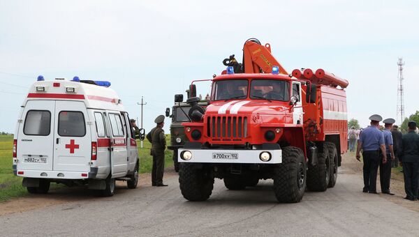 Машины пожарной и скорой помощи на территории поселка Урман Машины пожарной и скорой помощи на территории поселка Урман