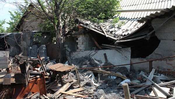 Жилой дом, разрушенный в результате обстрела Октябрьского района города Донецка Жилой дом, разрушенный в результате обстрела Октябрьского района города Донецка