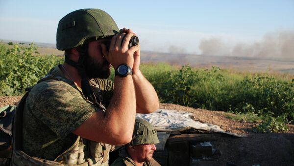 Бойцы 1-ой Славянской бригады ополчения Донецкой народной республики (ДНР) на позиции у линии соприкосновения с украинскими силовиками от Широкино до Тельманово в Донецкой области. Архивное фото Бойцы 1-ой Славянской бригады ополчения Донецкой народной республики (ДНР) на позиции у линии соприкосновения с украинскими силовиками от Широкино до Тельманово в Донецкой области. Архивное фото