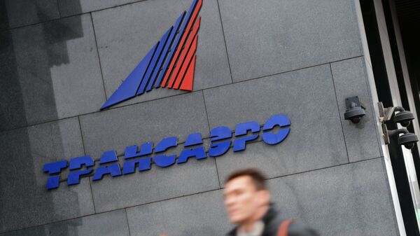 Логотип авиакомпании Трансаэро на здании в Москве Логотип авиакомпании Трансаэро на здании в Москве
