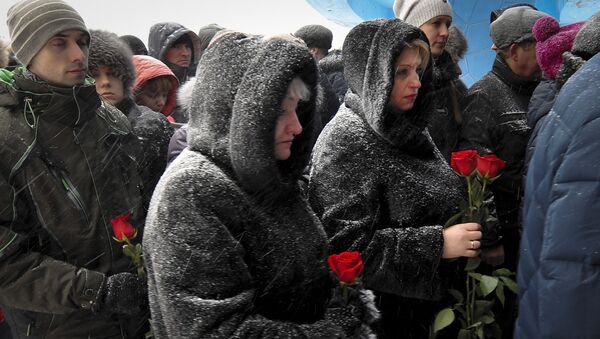 Церемония прощания с шахтерами, погибшими в результате аварии на шахте Северная. Архивное фото Церемония прощания с шахтерами, погибшими в результате аварии на шахте Северная. Архивное фото