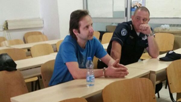 Совладелец турфирмы Лабиринт Сергей Азарсков, доставленный в Москву сотрудниками Интерпола Совладелец турфирмы Лабиринт Сергей Азарсков, доставленный в Москву сотрудниками Интерпола