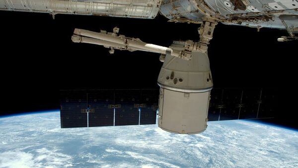 Отстыковка космического грузовика Dragon от МКС. Архивное фото Отстыковка космического грузовика Dragon от МКС. Архивное фото