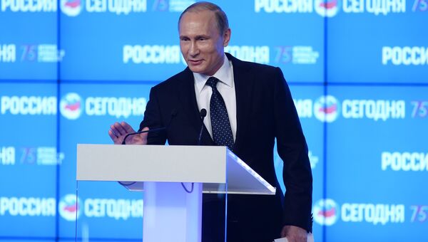 Президент Российской Федерации Владимир Путин во время посещения Международного информационного агентства Россия сегодня Президент Российской Федерации Владимир Путин во время посещения Международного информационного агентства Россия сегодня