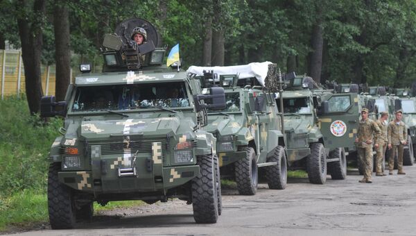 Колонна бронеавтомобилей КРАЗ во время Международных военных учений Rapid trident-2016 во Львовской области. 27 июня 2016 Колонна бронеавтомобилей КРАЗ во время Международных военных учений Rapid trident-2016 во Львовской области. 27 июня 2016