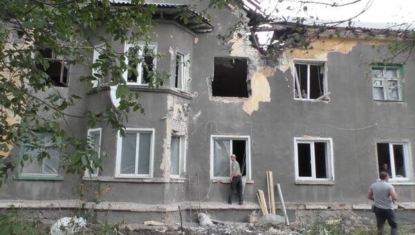 Последствия артобстрела в Горловке. Архивное фото Последствия артобстрела в Горловке. Архивное фото