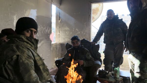 Военнослужащие в освобожденном квартале восточного Алеппо Военнослужащие в освобожденном квартале восточного Алеппо
