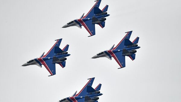 Многоцелевые истребители Су-30СМ. Архивное фото Многоцелевые истребители Су-30СМ. Архивное фото
