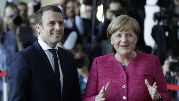 Канцлер Германии Ангела Меркель и президент Франции Эммануэль Макрон Канцлер Германии Ангела Меркель и президент Франции Эммануэль Макрон