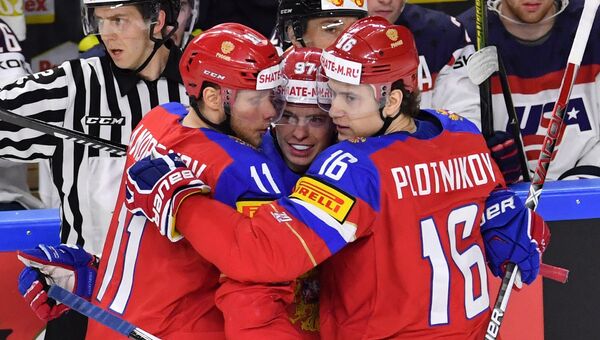 Игроки сборной России Сергей Андронов, Никикта Гусев, Сергей Плотников радуются забитой шайбе в матче группового этапа чемпионата мира по хоккею 2017 между сборными командами России и США Игроки сборной России Сергей Андронов, Никикта Гусев, Сергей Плотников радуются забитой шайбе в матче группового этапа чемпионата мира по хоккею 2017 между сборными командами России и США