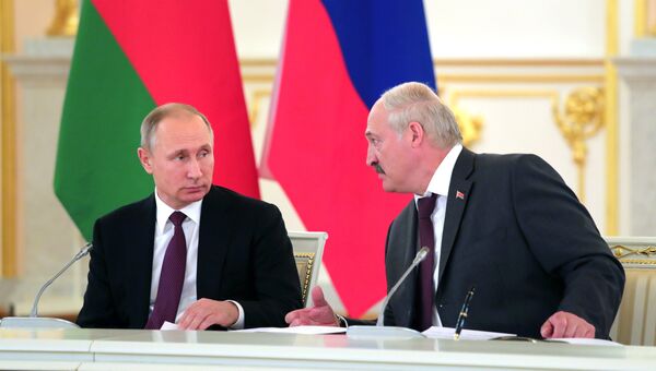 Владимир Путин и Александр Лукашенко. Архивное фото Владимир Путин и Александр Лукашенко. Архивное фото