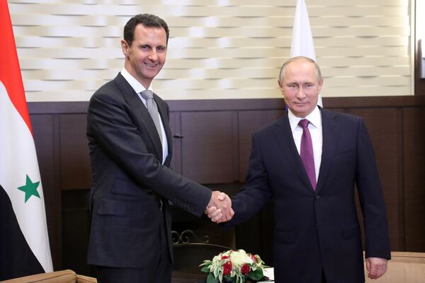 Президент РФ Владимир Путин и президент Сирии Башар Асад во время встречи Президент РФ Владимир Путин и президент Сирии Башар Асад во время встречи