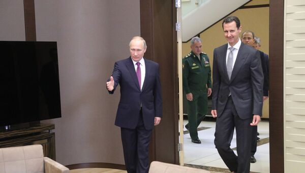 Президент РФ Владимир Путин и президент Сирии Башар Асад во время встречи Президент РФ Владимир Путин и президент Сирии Башар Асад во время встречи