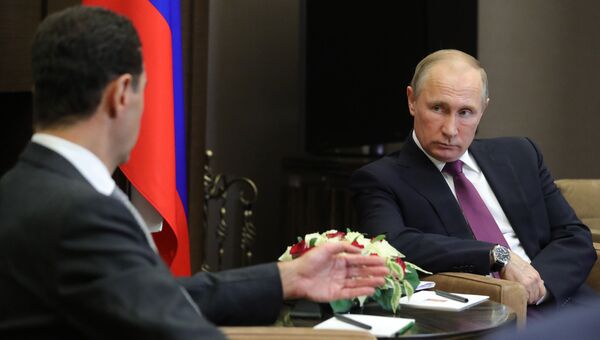 Президент РФ Владимир Путин и президент Сирии Башар Асад во время встречи Президент РФ Владимир Путин и президент Сирии Башар Асад во время встречи
