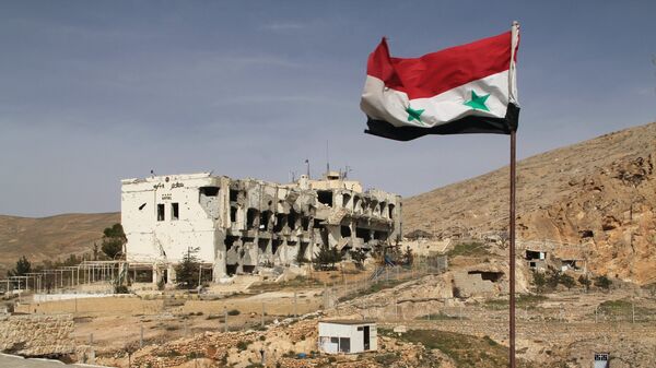 Разрушенное здание в Сирии Разрушенное здание в Сирии