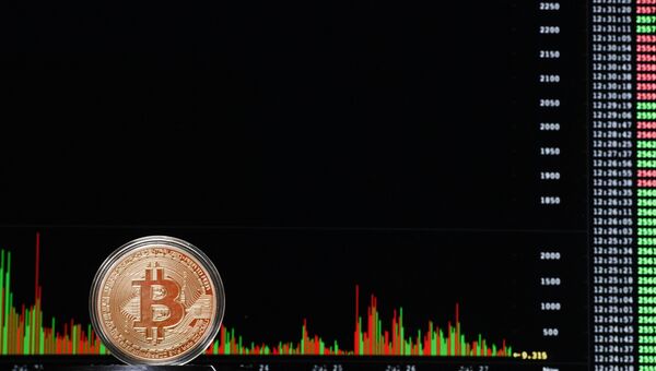 Криптовалюта биткойн. Архивное фото Криптовалюта биткойн. Архивное фото