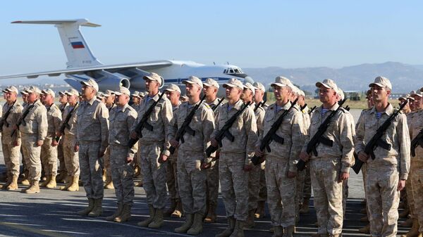 Российские военнослужащие на авиабазе Хмеймим в Сирии Российские военнослужащие на авиабазе Хмеймим в Сирии