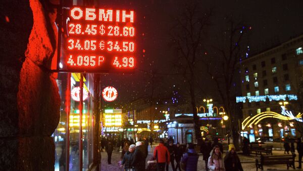 Информационное табло пункта обмена валют в центре Киева. 12 января 2018 Информационное табло пункта обмена валют в центре Киева. 12 января 2018