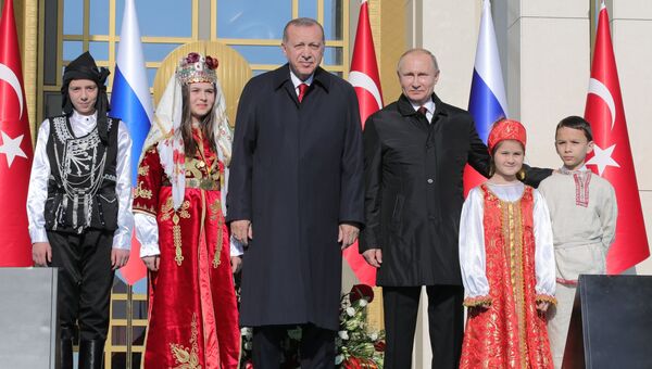 Президент РФ Владимир Путин и президент Турецкой Республики Реджеп Тайип Эрдоган на церемонии запуска строительства первого энергоблока АЭС Аккую. 3 апреля 2018 Президент РФ Владимир Путин и президент Турецкой Республики Реджеп Тайип Эрдоган на церемонии запуска строительства первого энергоблока АЭС Аккую. 3 апреля 2018