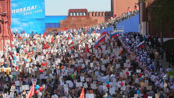 Участники акции Бессмертный полк в Москве. 9 мая 2018 Участники акции Бессмертный полк в Москве. 9 мая 2018