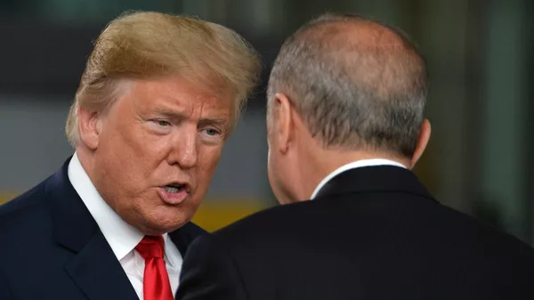 Дональд Трамп и президент Турции Реджеп Тайип Эрдоган на саммите стран-участниц НАТО в Брюсселе. 11 июля 2018
