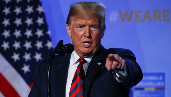 Президент США Дональд Трамп на пресс-конференции после участия в саммите НАТО в Брюсселе, Бельгии. 12 июля 2018 Президент США Дональд Трамп на пресс-конференции после участия в саммите НАТО в Брюсселе, Бельгии. 12 июля 2018
