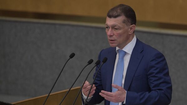Министр труда и социальной защиты РФ Максим Топилин выступает на пленарном заседании Государственной Думы РФ. 19 июля 2018 Министр труда и социальной защиты РФ Максим Топилин выступает на пленарном заседании Государственной Думы РФ. 19 июля 2018