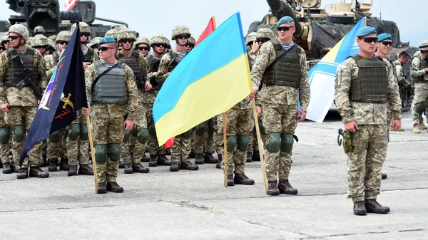 Военнослужащие армии Украины на открытии международных военных учений под эгидой НАТО в Грузии Военнослужащие армии Украины на открытии международных военных учений под эгидой НАТО в Грузии